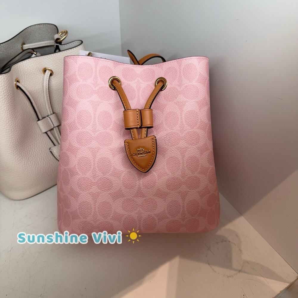 NWT Coach CEA23 Rowan Bucket Bag In Signature Canvas With Charms Powder Pink
